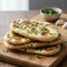 The Best Easy Garlic Naan Bread Recipe (Soft & Bubbly)