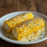Irresistible Cheesy Herb Butter Sweet Corn Recipe