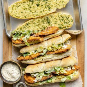 Crispy Chicken Caesar Sandwiches on Garlic Bread