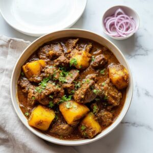 lamb and potato curry featured 1776882262335