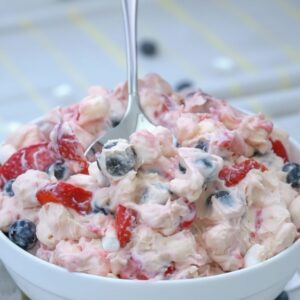 Easy Patriotic Berry Cheesecake Salad (No-Bake Dessert) 4 red white and blue cheesecake salad featured 1780676677455